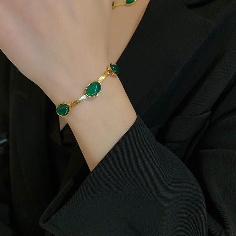 Stylish bracelet set with oval green crystal for women