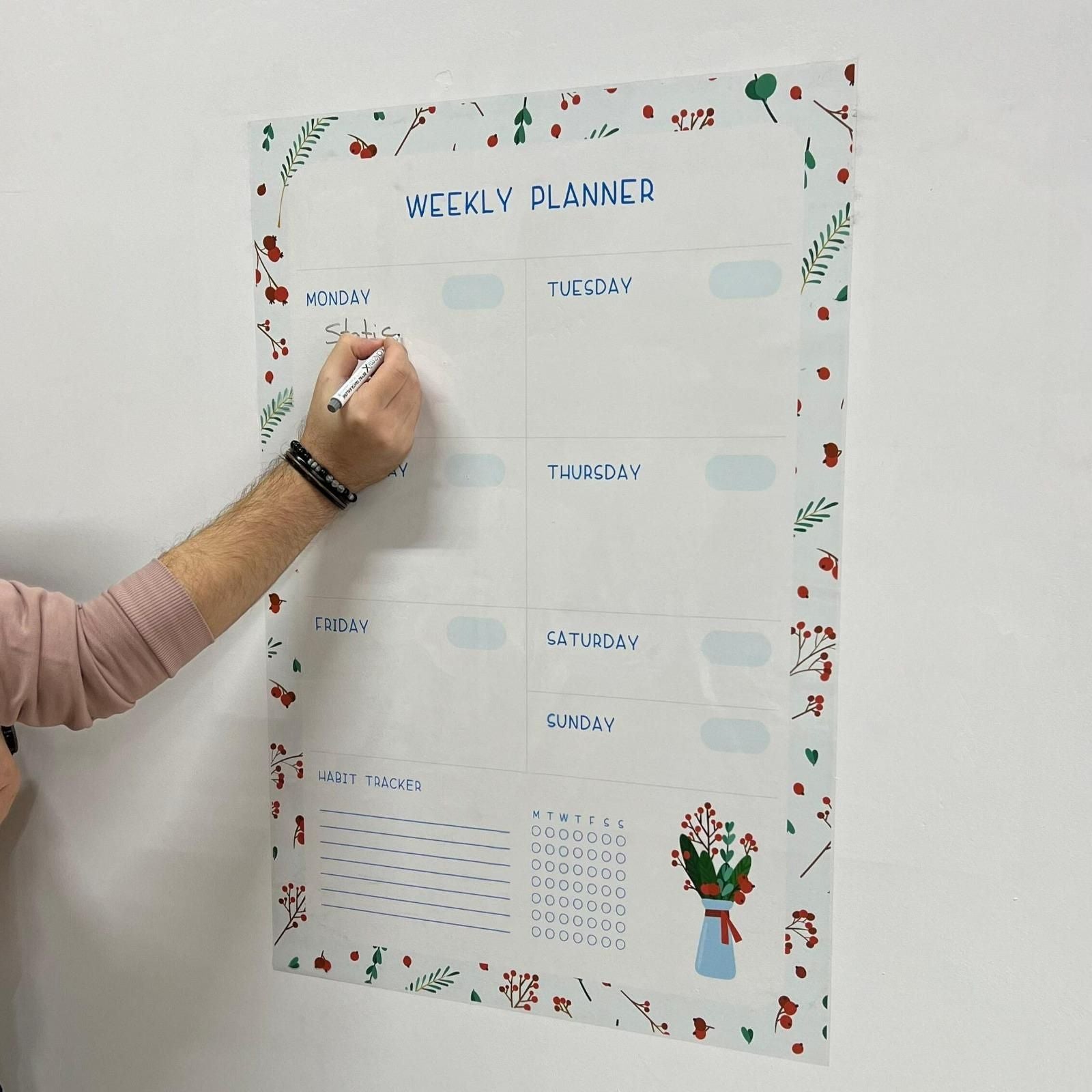 "Minimalist white weekly planner organizer sheet with clean columns for each day, designed for adult use. The sheet is lightweight and flat-laying, made from plastic and paper with a sturdy cardboard cover. Ideal for productivity, scheduling, and weekly task management."