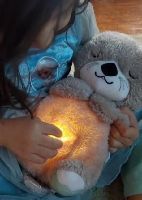 Breathing Teddy Bear with soothing music in soft grey plush fabric, perfect comfort toy for kids and adults
