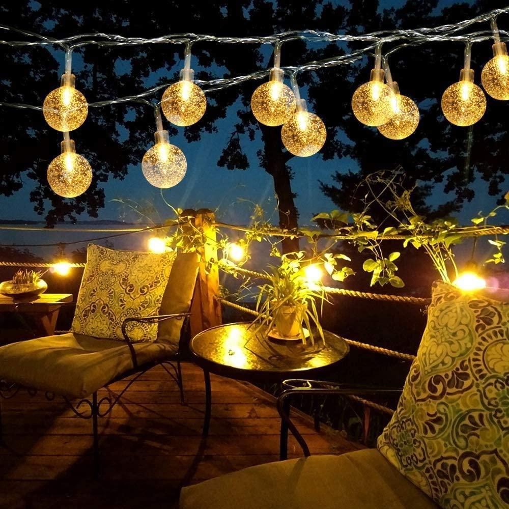 16 LED Crystal Balls String Lights in yellow, perfect for Diwali, Christmas, weddings, parties, and home decoration. High-brightness AC powered lights with shimmery crystal glass balls, portable and safe for indoor and outdoor use, 3-meter string, 16 LEDs, warm glow, magical ambiance.
